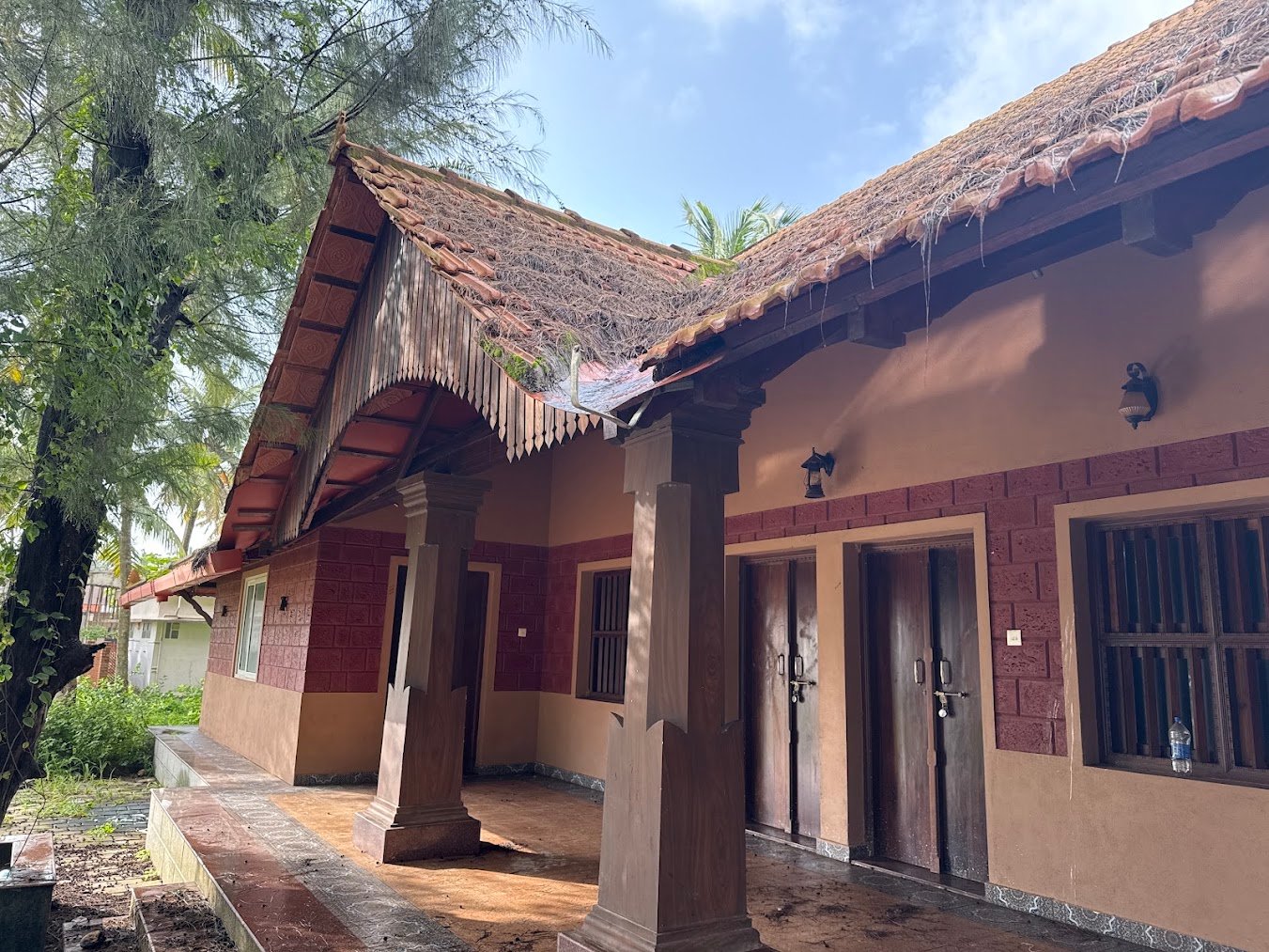 Evara by Beach tiled-roof architecture